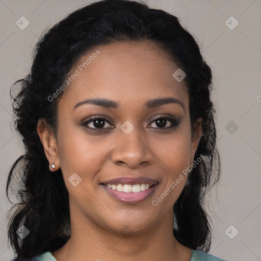 Joyful black young-adult female with long  brown hair and brown eyes