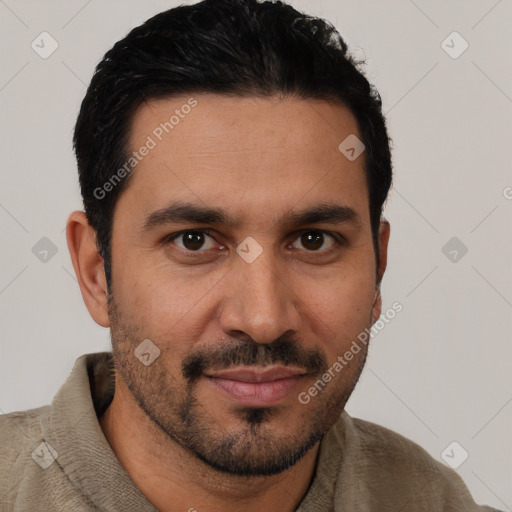 Joyful latino young-adult male with short  black hair and brown eyes