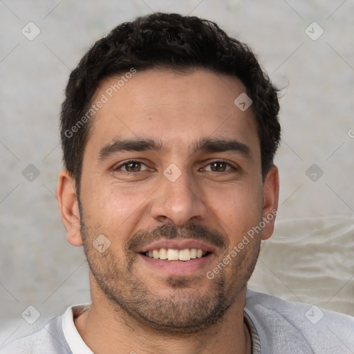 Joyful white young-adult male with short  black hair and brown eyes