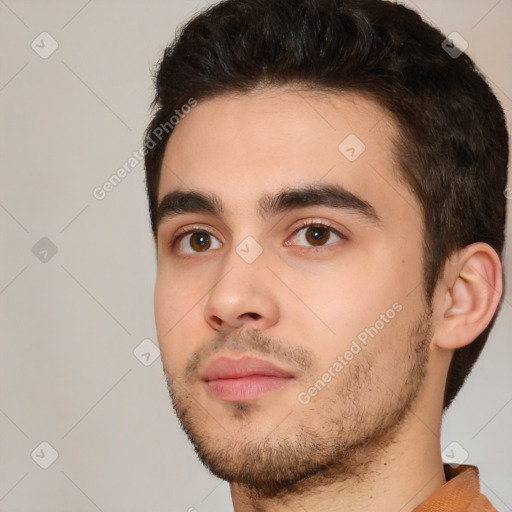 Neutral white young-adult male with short  brown hair and brown eyes