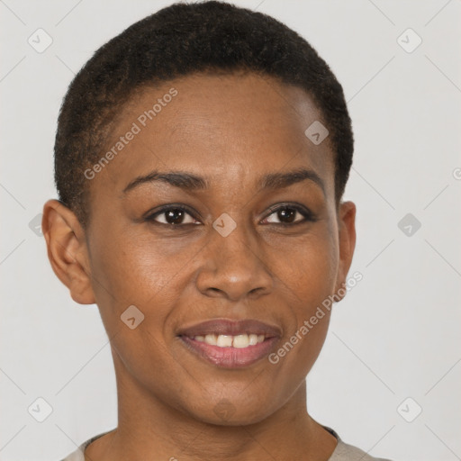 Joyful black young-adult female with short  brown hair and brown eyes