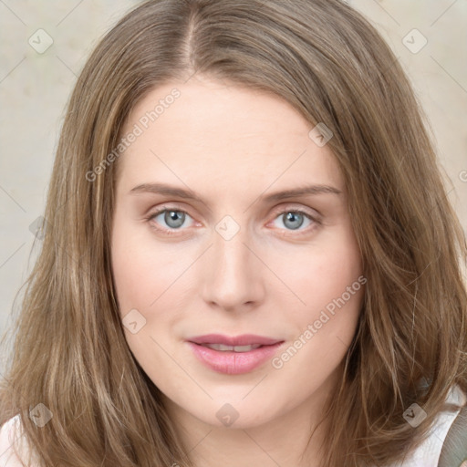 Joyful white young-adult female with long  brown hair and green eyes