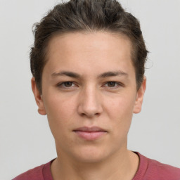 Neutral white young-adult female with short  brown hair and brown eyes