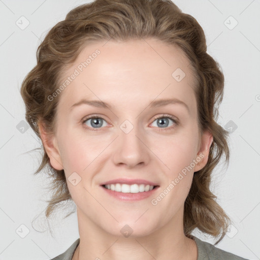 Joyful white young-adult female with medium  brown hair and blue eyes