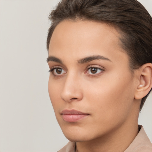 Neutral white young-adult female with short  brown hair and brown eyes