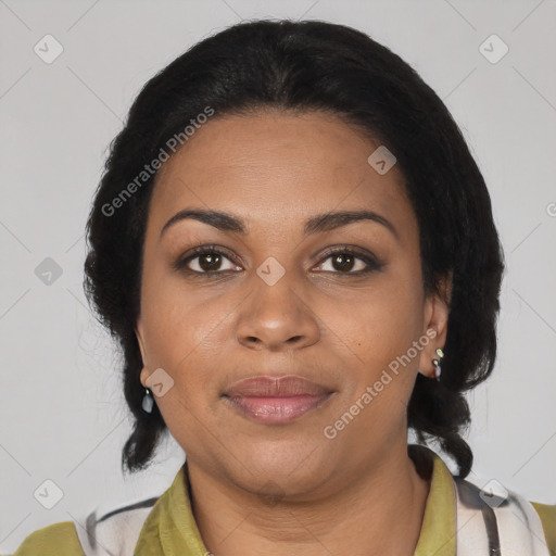 Joyful black adult female with medium  black hair and brown eyes