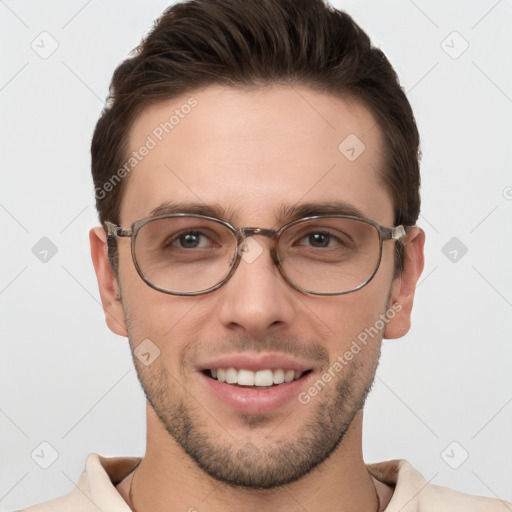 Joyful white young-adult male with short  brown hair and grey eyes