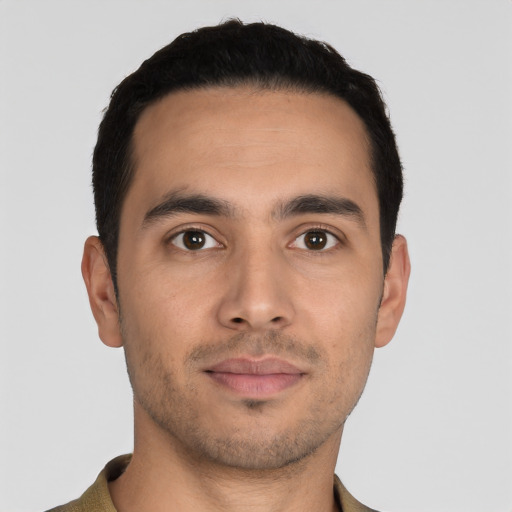 Neutral latino young-adult male with short  black hair and brown eyes