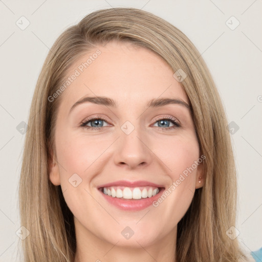 Joyful white young-adult female with long  brown hair and grey eyes