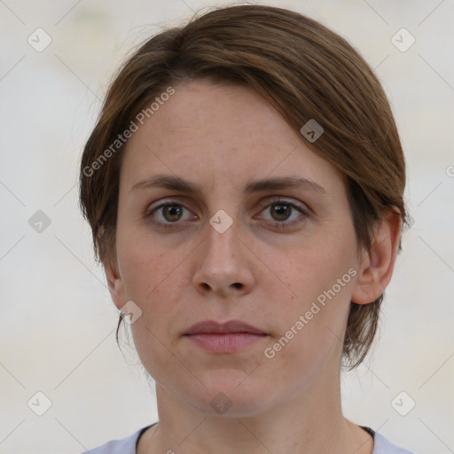 Neutral white young-adult female with medium  brown hair and grey eyes