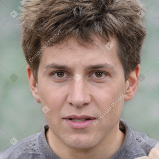 Joyful white adult male with short  brown hair and grey eyes