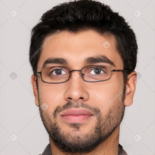 Neutral white young-adult male with short  black hair and brown eyes