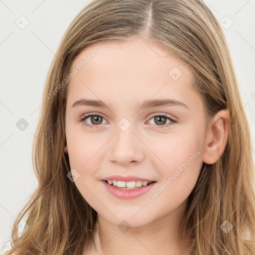 Joyful white child female with long  brown hair and brown eyes