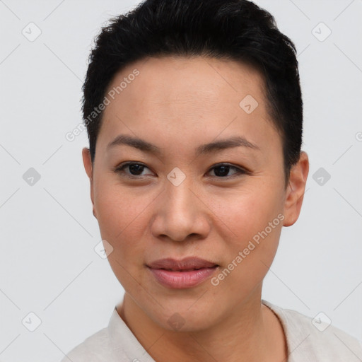 Joyful asian young-adult female with short  brown hair and brown eyes