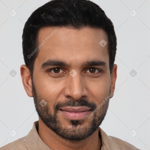 Joyful latino young-adult male with short  black hair and brown eyes