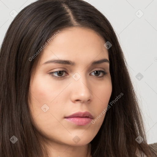 Neutral white young-adult female with long  brown hair and brown eyes