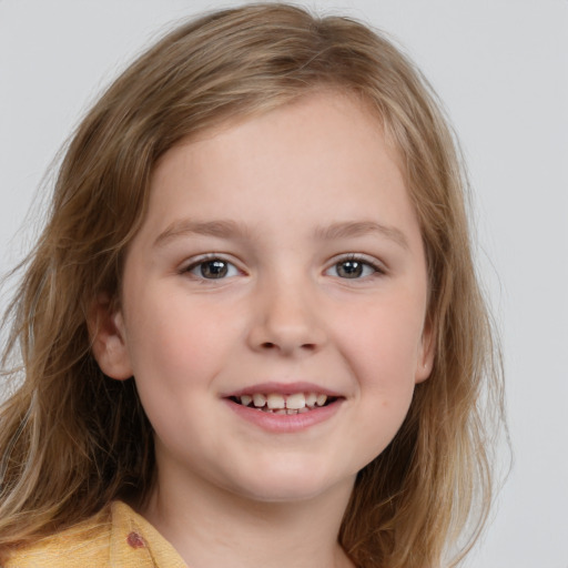 Joyful white child female with medium  brown hair and grey eyes