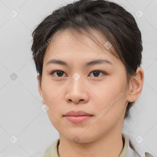 Neutral asian young-adult female with medium  brown hair and brown eyes