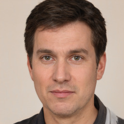 Neutral white adult male with short  brown hair and brown eyes