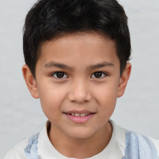 Joyful white child male with short  brown hair and brown eyes