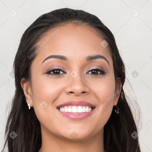 Joyful white young-adult female with long  black hair and brown eyes