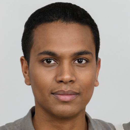 Neutral black young-adult male with short  black hair and brown eyes
