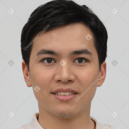 Joyful asian young-adult male with short  brown hair and brown eyes