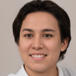 Joyful white young-adult female with medium  brown hair and brown eyes