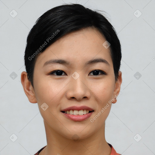 Joyful asian young-adult female with short  black hair and brown eyes