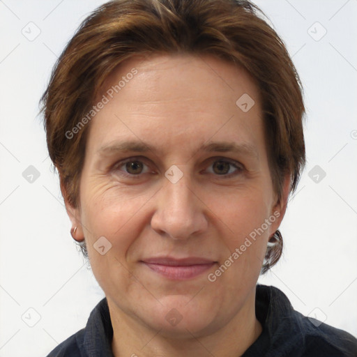 Joyful white adult female with short  brown hair and brown eyes