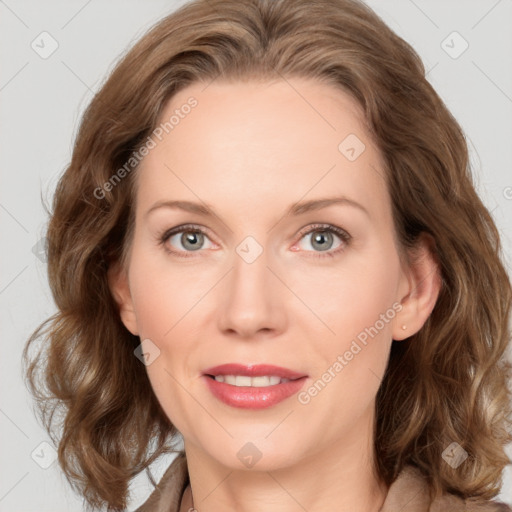 Joyful white young-adult female with medium  brown hair and green eyes