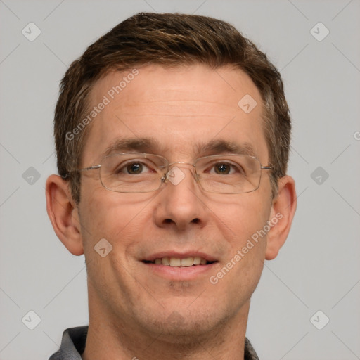 Joyful white adult male with short  brown hair and grey eyes