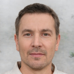 Neutral white adult male with short  brown hair and brown eyes