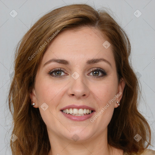 Joyful white young-adult female with long  brown hair and green eyes