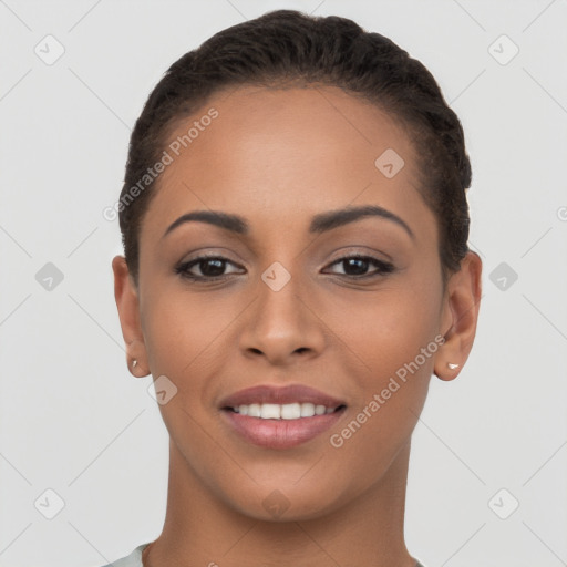 Joyful latino young-adult female with short  brown hair and brown eyes