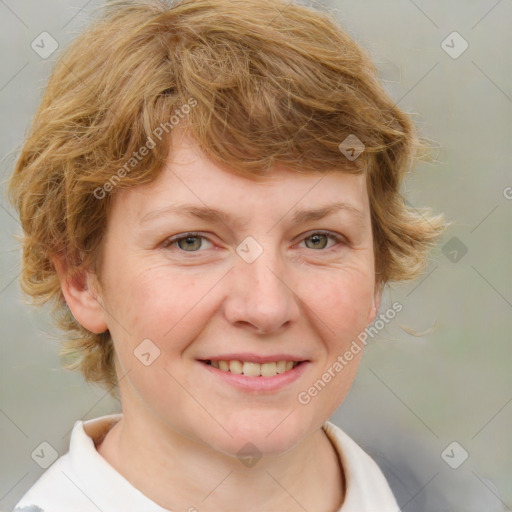 Joyful white young-adult female with medium  brown hair and blue eyes