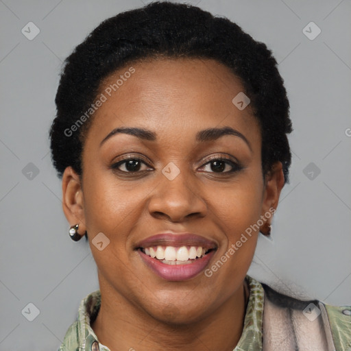 Joyful black young-adult female with short  brown hair and brown eyes