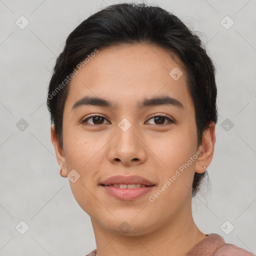 Joyful asian young-adult female with short  brown hair and brown eyes