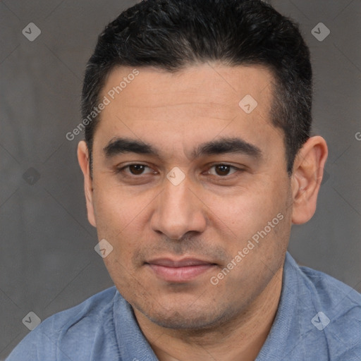 Joyful white young-adult male with short  black hair and brown eyes