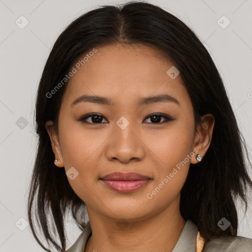 Joyful asian young-adult female with long  brown hair and brown eyes