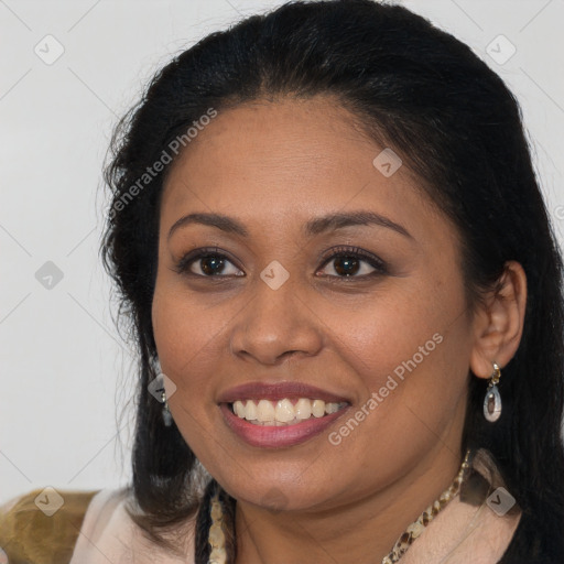 Joyful latino young-adult female with long  brown hair and brown eyes