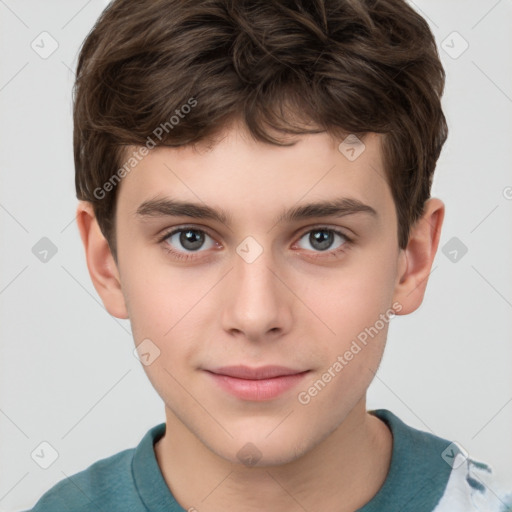 Joyful white child male with short  brown hair and brown eyes