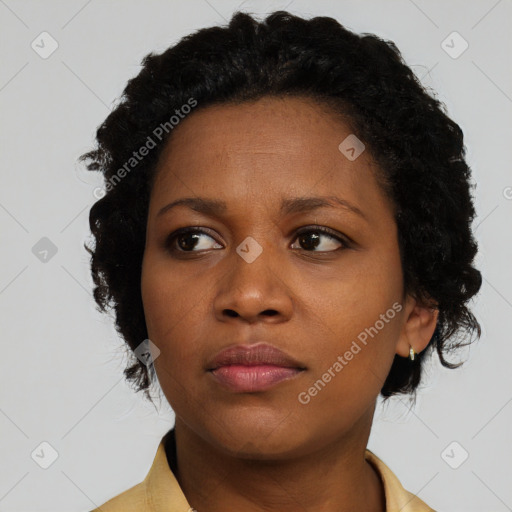 Neutral black young-adult female with medium  black hair and brown eyes