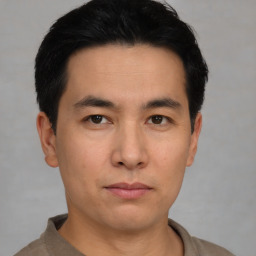 Neutral asian young-adult male with short  black hair and brown eyes