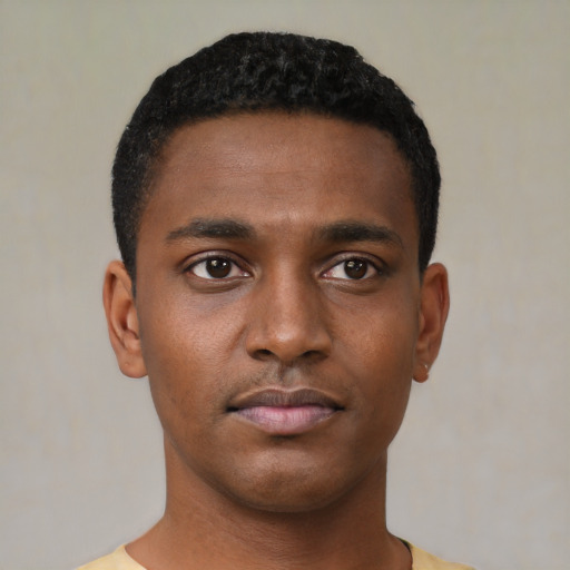 Neutral black young-adult male with short  black hair and brown eyes