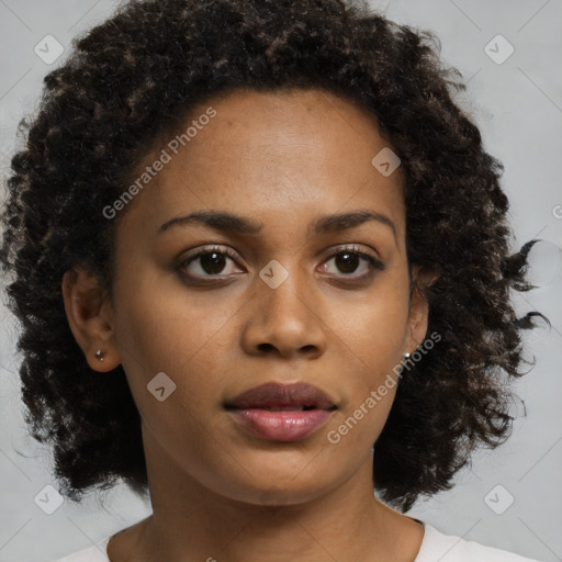 Neutral black young-adult female with medium  brown hair and brown eyes