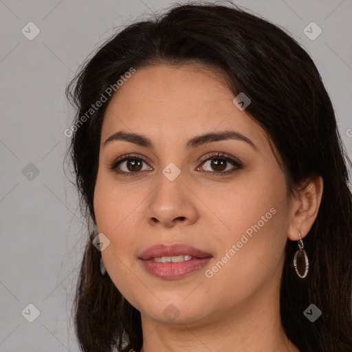 Joyful white young-adult female with long  brown hair and brown eyes