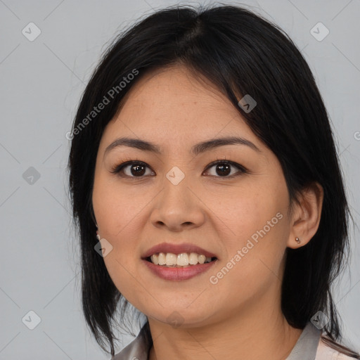 Joyful asian young-adult female with medium  black hair and brown eyes