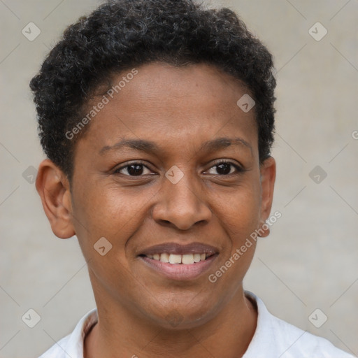 Joyful black young-adult female with short  brown hair and brown eyes