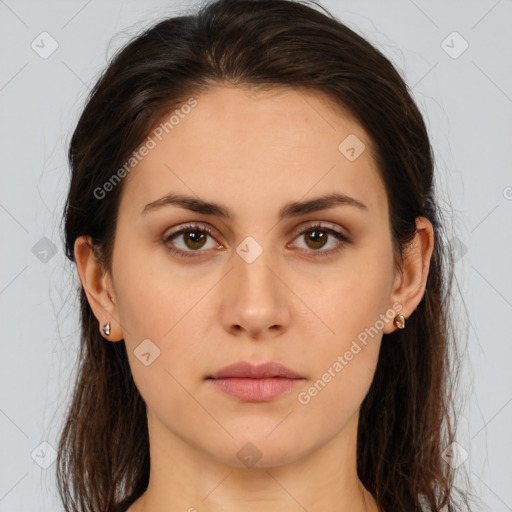 Neutral white young-adult female with long  brown hair and brown eyes